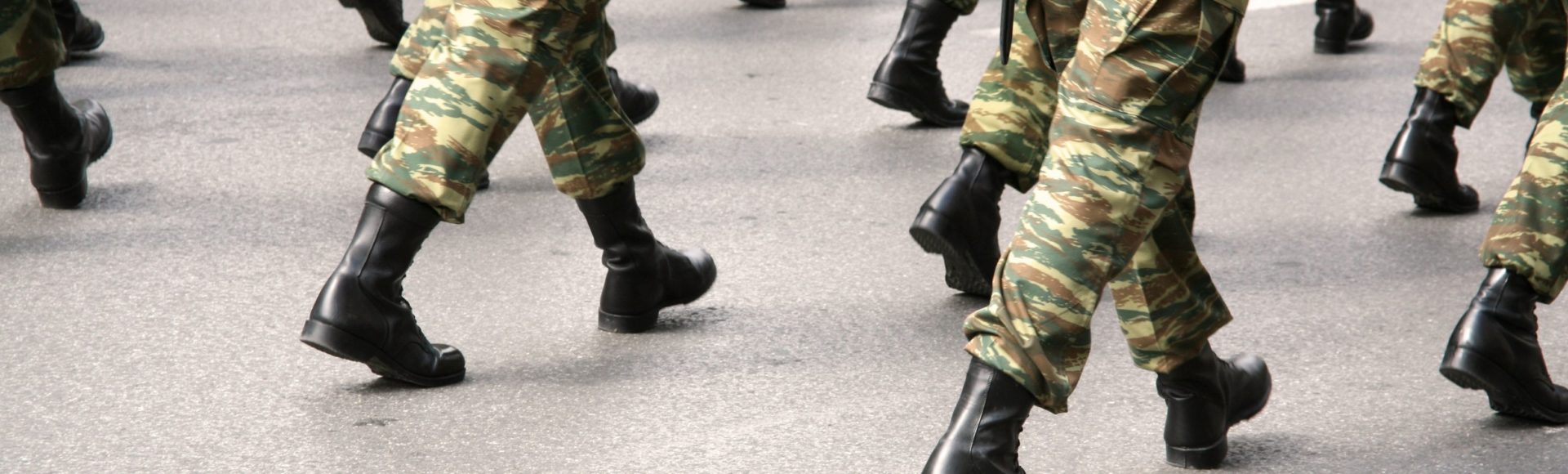 Soldiers marching, zoomed in on their boots moving in unison