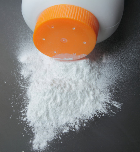 Talcum powder spilling on a surface