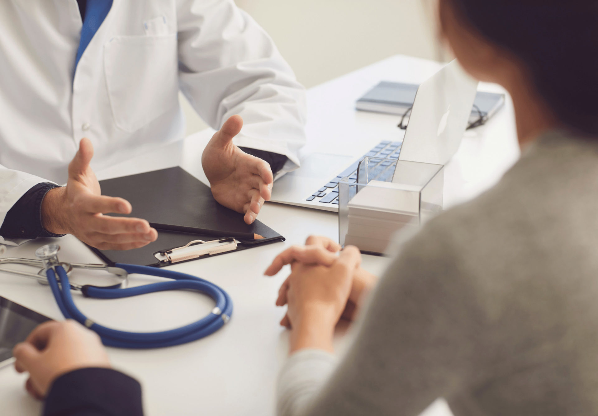 doctor with patient discussing health