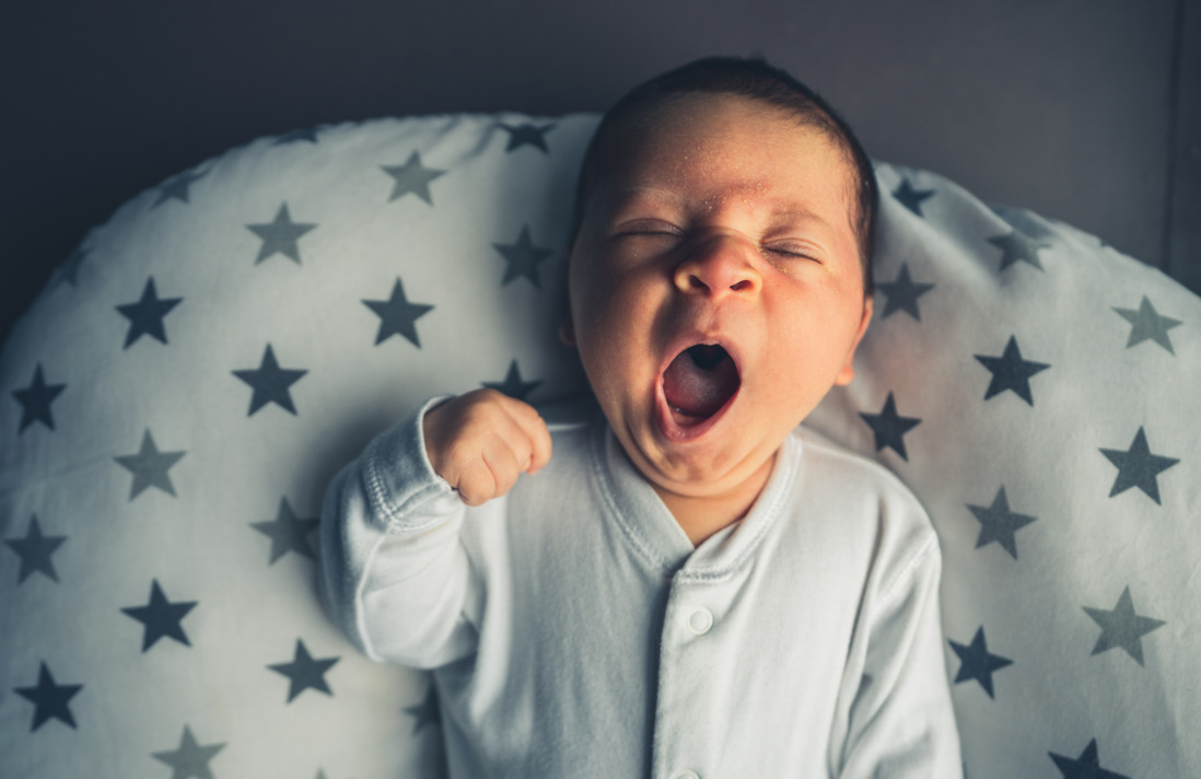 newborn baby yawning 
